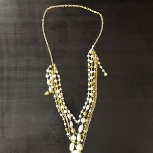 Elegant pearl and gold necklace